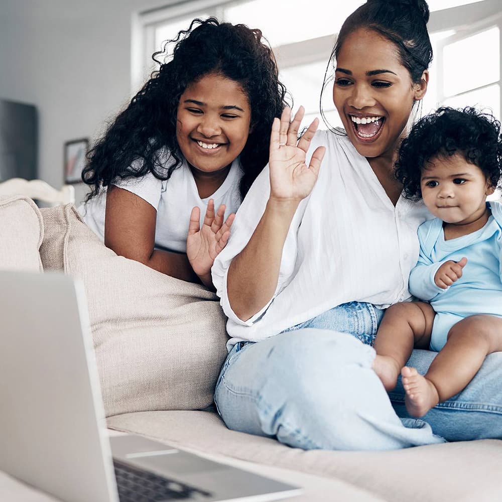 Happy family using telehealth services